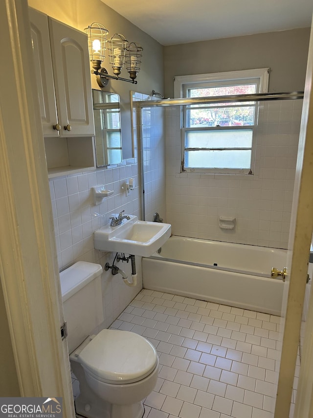 50 Pine Valley Dr, Athens, GA 30606 - bathroom with tile patterned floors, toilet, a sink, shower / tub combination, and tile walls