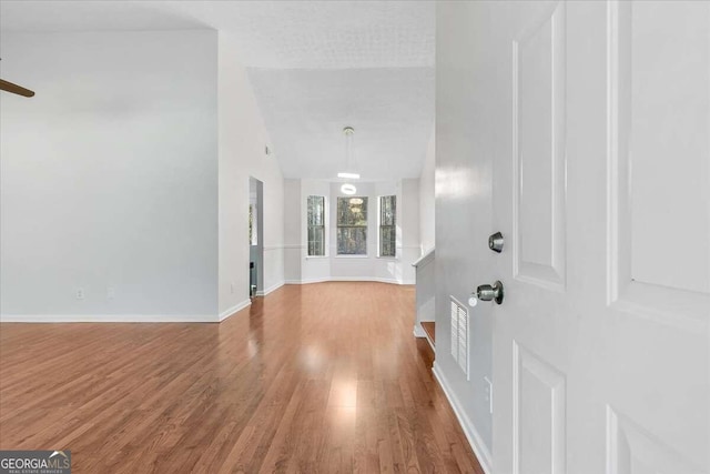 foyer with hardwood / wood-style floors