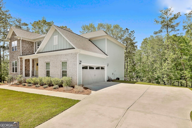 view of home's exterior featuring a yard and a garage