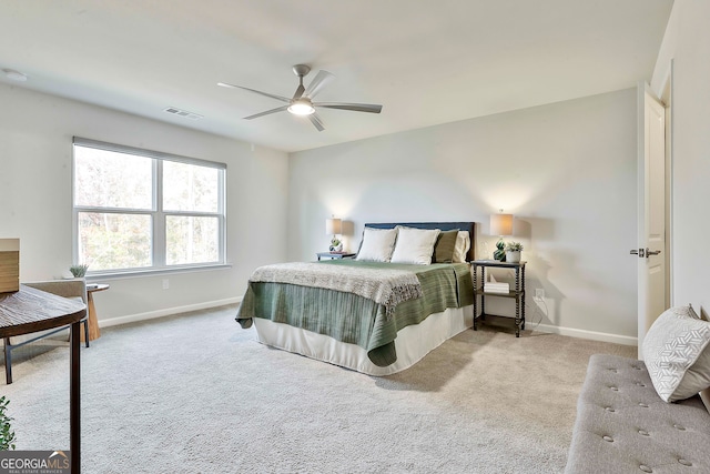 carpeted bedroom featuring ceiling fan