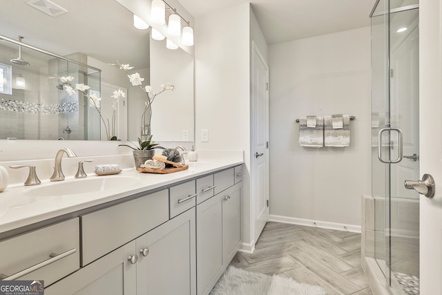 bathroom with vanity and walk in shower