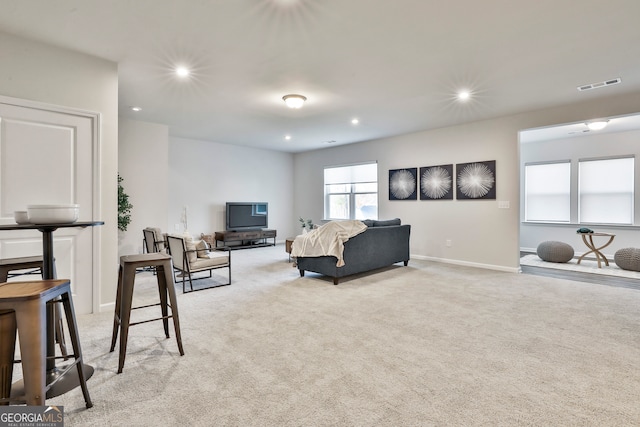 living room with light carpet