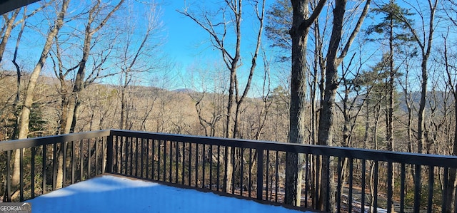 deck with a forest view