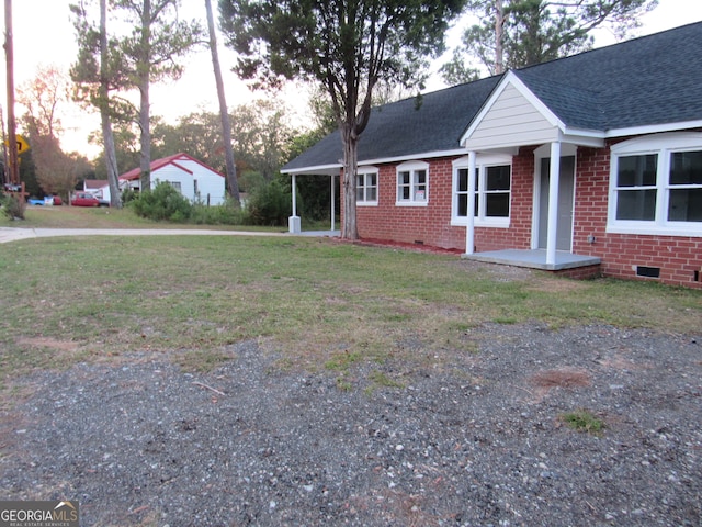 exterior space with a yard