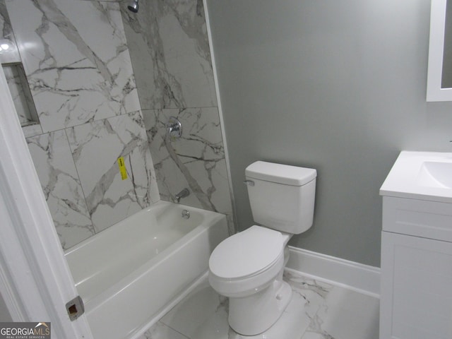 full bathroom with vanity, tiled shower / bath combo, and toilet