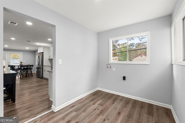 laundry room featuring hardwood / wood-style flooring