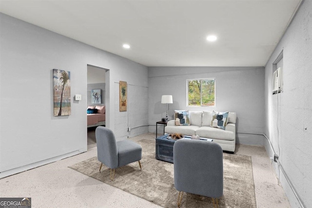 living room featuring vaulted ceiling