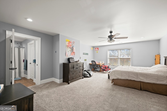 carpeted bedroom with ceiling fan