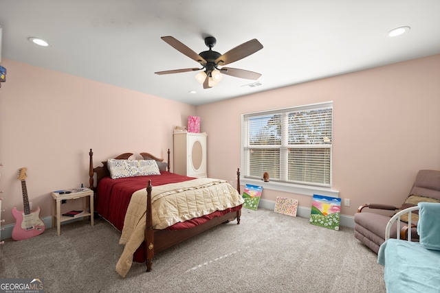 carpeted bedroom featuring ceiling fan