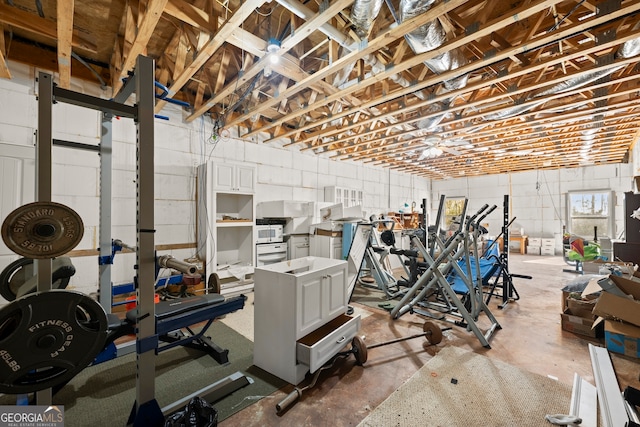 basement with ceiling fan