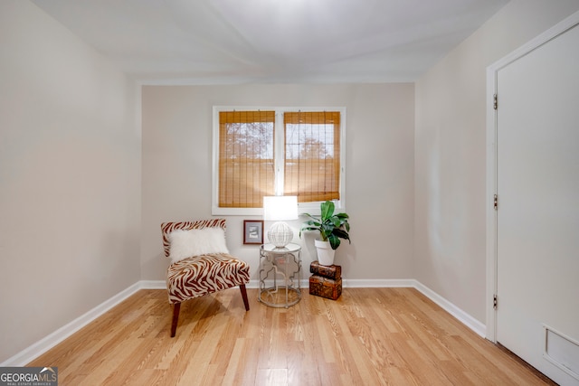 living area featuring light hardwood / wood-style floors