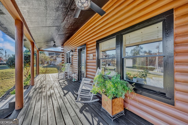 deck featuring ceiling fan and a porch