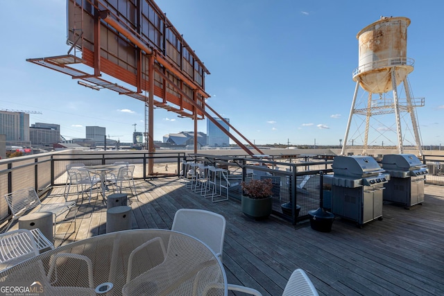 wooden deck with area for grilling