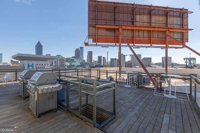 wooden deck with grilling area