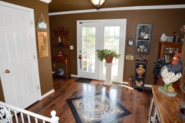 entryway featuring dark wood-type flooring and ornamental molding