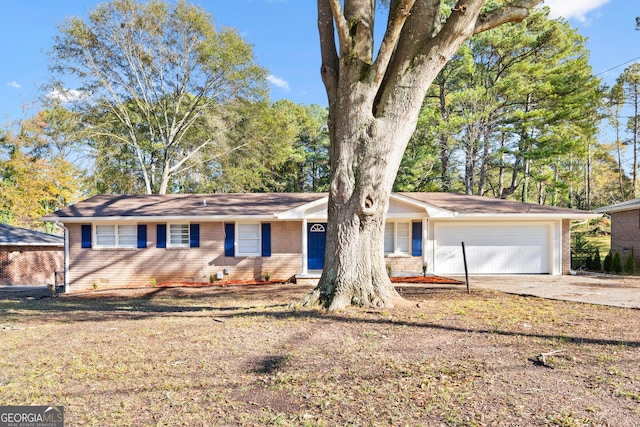 single story home with a garage