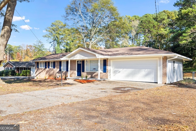 single story home with a garage