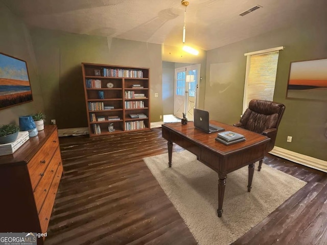 home office featuring dark hardwood / wood-style floors