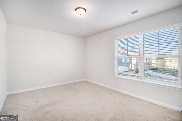 empty room featuring carpet floors