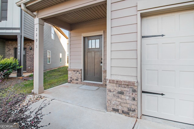 entrance to property with a porch