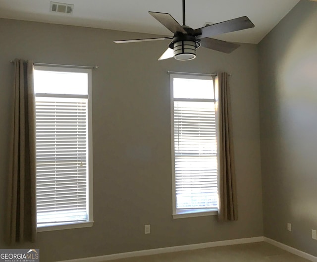 empty room featuring ceiling fan