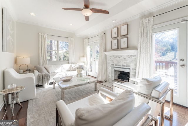 111 Swanton Hill Ct, Decatur, GA 30030 - living area featuring ornamental molding, a ceiling fan, wood finished floors, french doors, and a fireplace
