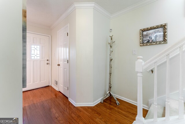111 Swanton Hill Ct, Decatur, GA 30030 - entrance foyer featuring stairs, wood finished floors, baseboards, and ornamental molding