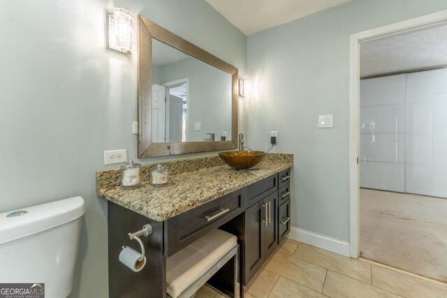 111 Swanton Hill Ct, Decatur, GA 30030 - bathroom featuring tile patterned flooring, toilet, vanity, and baseboards