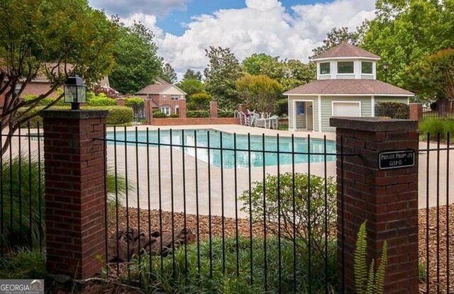 111 Swanton Hill Ct, Decatur, GA 30030 - view of pool with a patio, fence, and a fenced in pool