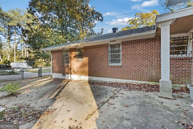 view of home's exterior with a patio