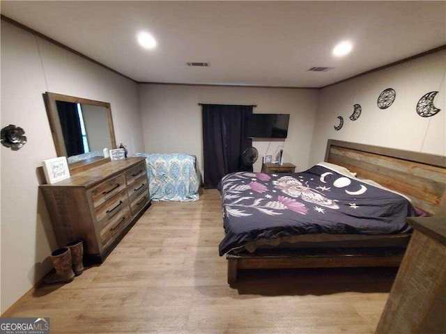 bedroom featuring light wood-type flooring