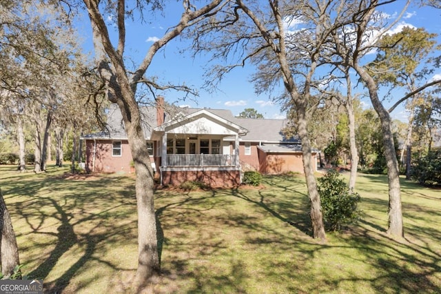 view of front of home with a front yard