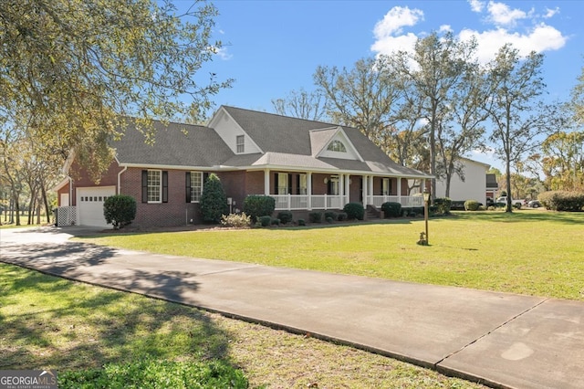 view of front facade with a porch, a garage, and a front lawn