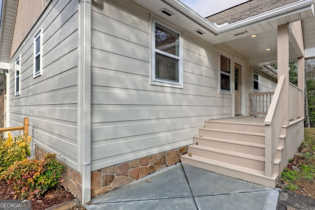 4502 Ramsay Dr, Hiawassee, GA 30546 - view of property exterior with roof with shingles
