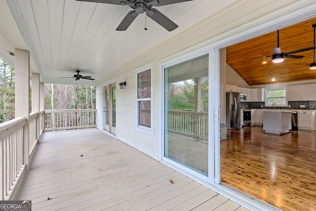 4502 Ramsay Dr, Hiawassee, GA 30546 - wooden terrace with ceiling fan