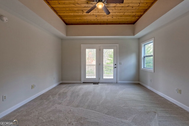 4502 Ramsay Dr, Hiawassee, GA 30546 - spare room with wooden ceiling, carpet floors, baseboards, ceiling fan, and a tray ceiling