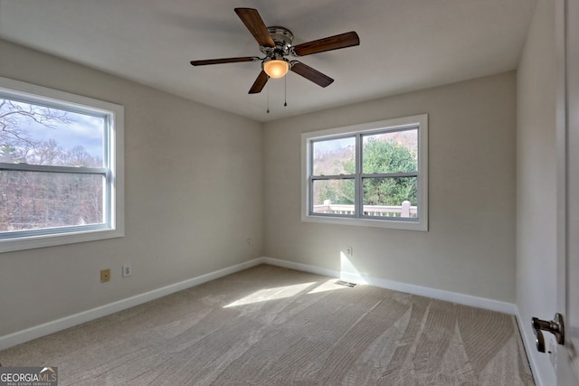 4502 Ramsay Dr, Hiawassee, GA 30546 - carpeted empty room with baseboards and a ceiling fan