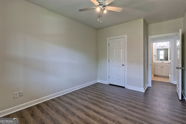 4502 Ramsay Dr, Hiawassee, GA 30546 - unfurnished bedroom featuring baseboards, dark wood finished floors, and a ceiling fan