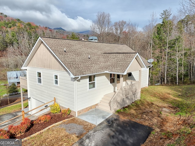 view of property exterior featuring a garage