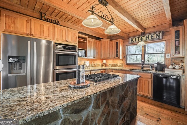 laundry room with independent washer and dryer and light tile patterned flooring