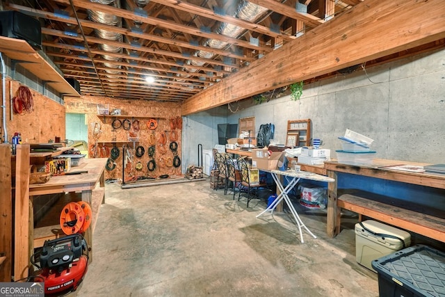 basement with a workshop area