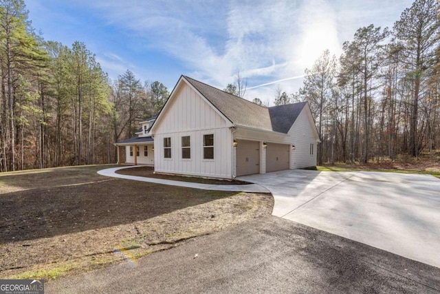 view of property exterior featuring a garage