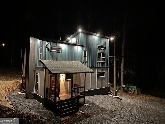 view of back house at night