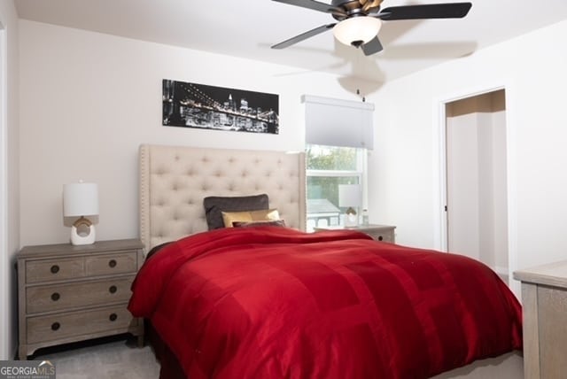 bedroom with carpet flooring and ceiling fan