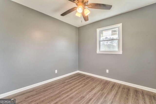 unfurnished bedroom with light hardwood / wood-style floors and ceiling fan