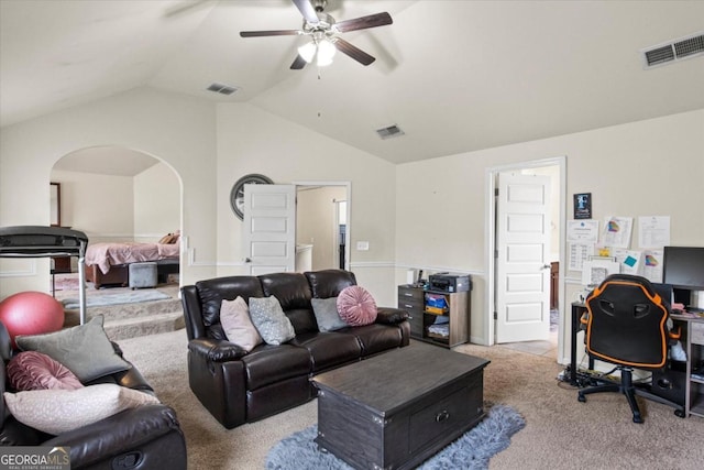 living room featuring light carpet, vaulted ceiling, and ceiling fan