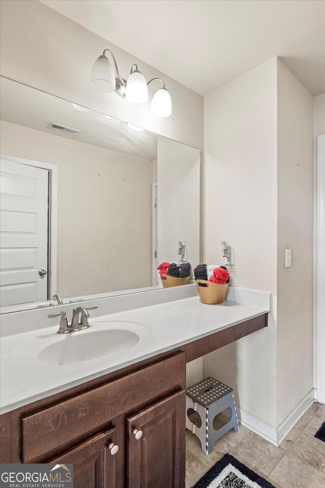 bathroom featuring vanity and tile patterned floors