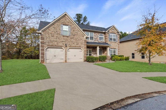 view of front of house featuring a garage and a front lawn