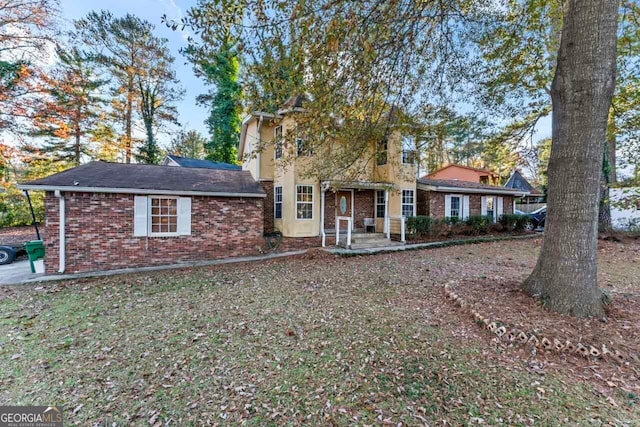 view of front of home with a patio