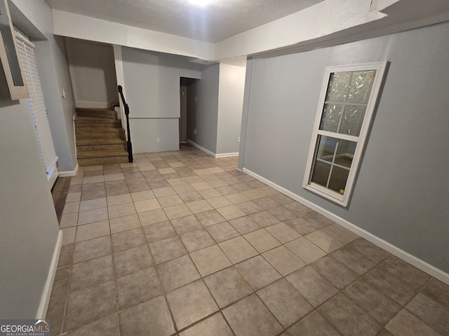 view of tiled spare room